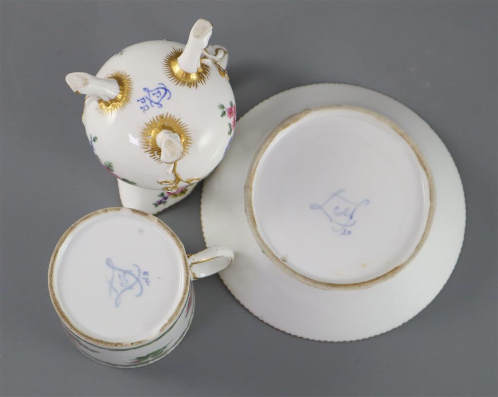 A Sevres cream jug, c.1768, and a Sevres hard paste coffee can and saucer, c.1781, (3)